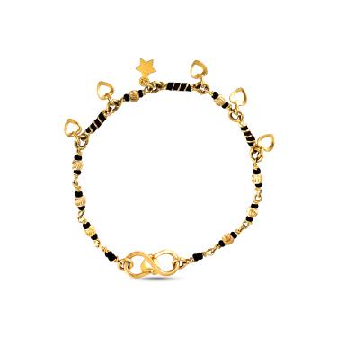 Gold & black beaded infant bracelet with heart and star  shape charms 